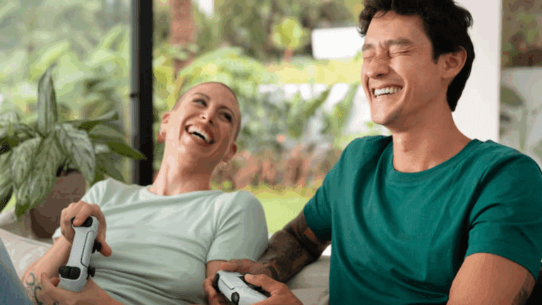 Two queer persons happily playing video games in an inpatient drug rehabilitation center.