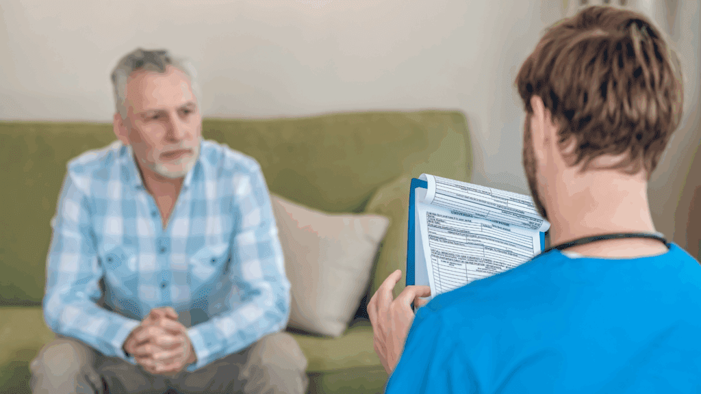 A gay person and a drug rehab nurse in an intake for alcohol withdrwawal.